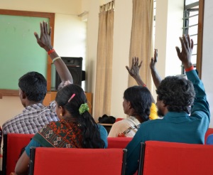 Clients eagerly interact during sessions about their legal rights and community resources.
